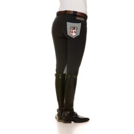 A person wearing black pants and boots