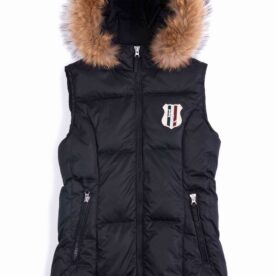 A black vest with a fur hood and a badge on the front.