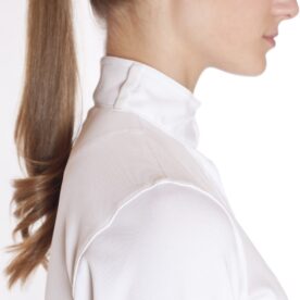 A woman with long hair in a ponytail.
