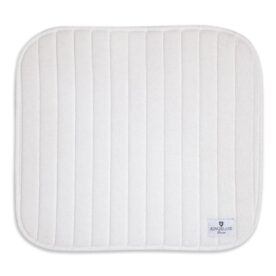 A white blanket sitting on top of a floor.