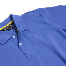 A close up of the collar on a blue polo shirt