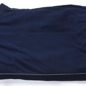 A blue blanket with black trim on top of it.