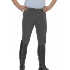 A man wearing black boots and gray pants.