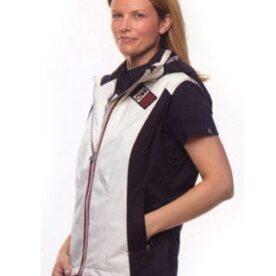 A woman wearing a black and white vest