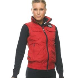 A woman wearing a red and black jacket