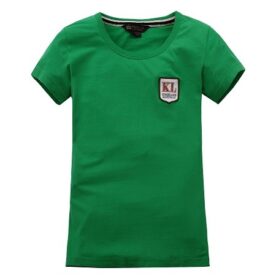 A green t-shirt with a patch on the chest.