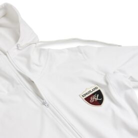 A close up of the hood on a white jacket