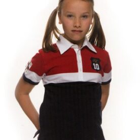 A girl with pigtails wearing a red and black shirt.