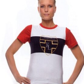 A woman wearing a red, white and black shirt.