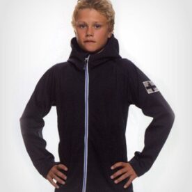 A young boy wearing a black jacket with blue trim.