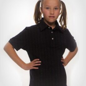 A young girl with pigtails posing for the camera.